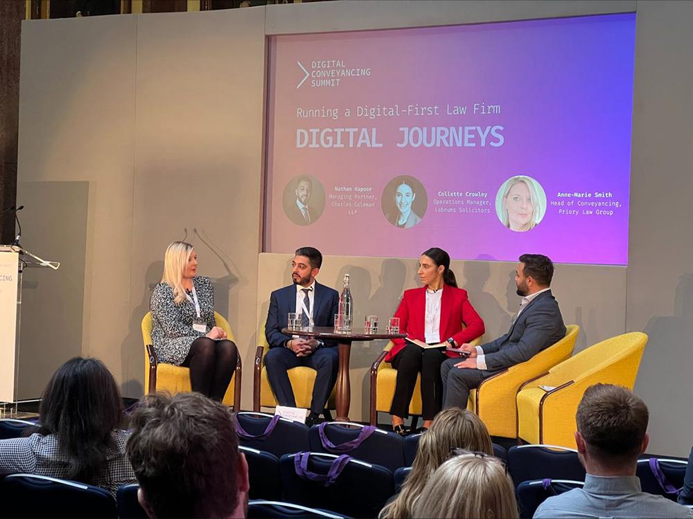 panel of four people, two men and two women, at the Digital Conveyancing Summit 2022